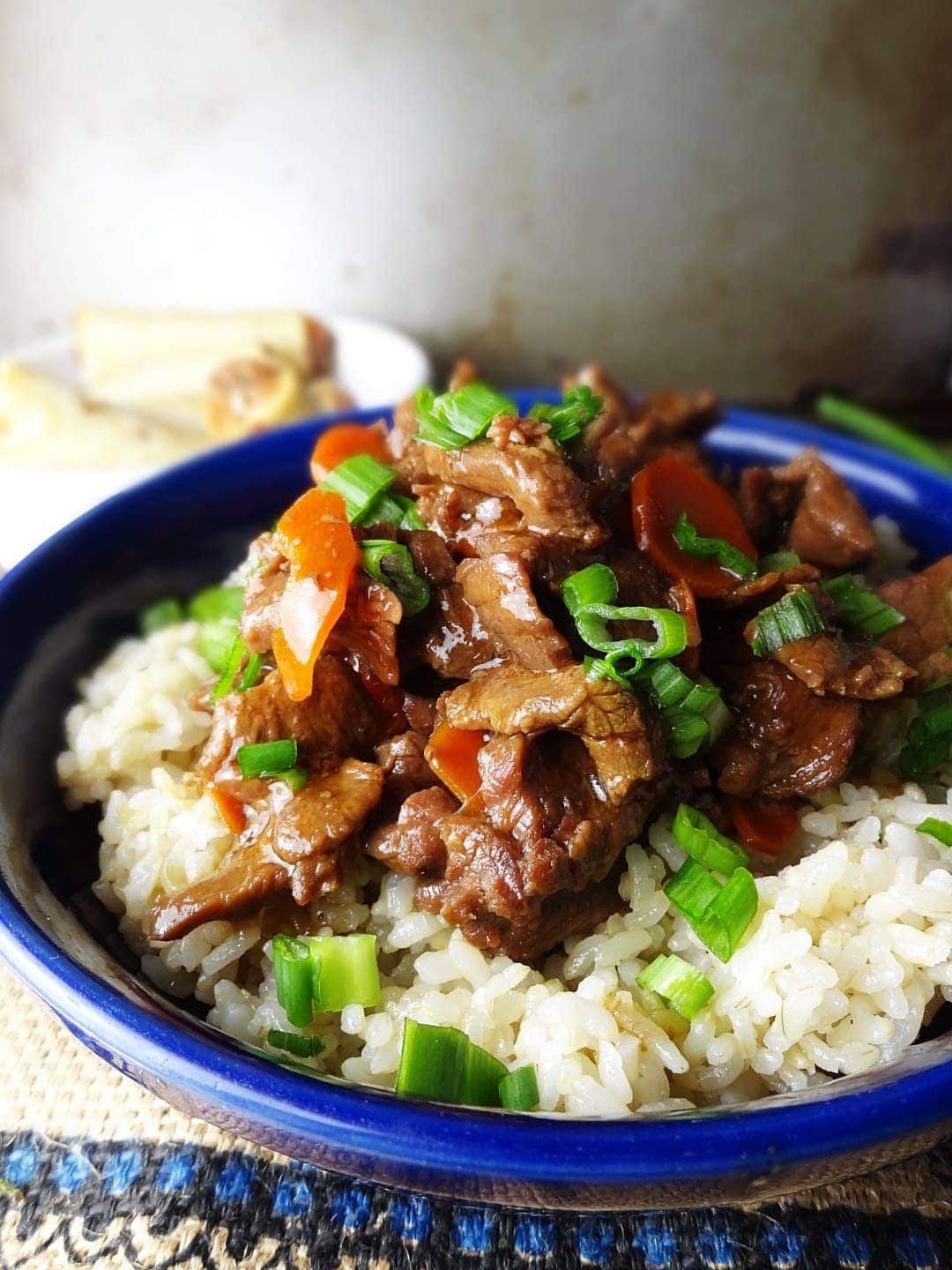 A plate of beef, rice and broccoli