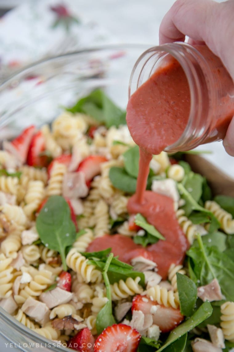 This Balsamic Strawberry Pasta Salad with chicken, pasta, basil, spinach, sweet strawberries, and a tangy Strawberry Balsamic Vinaigrette.