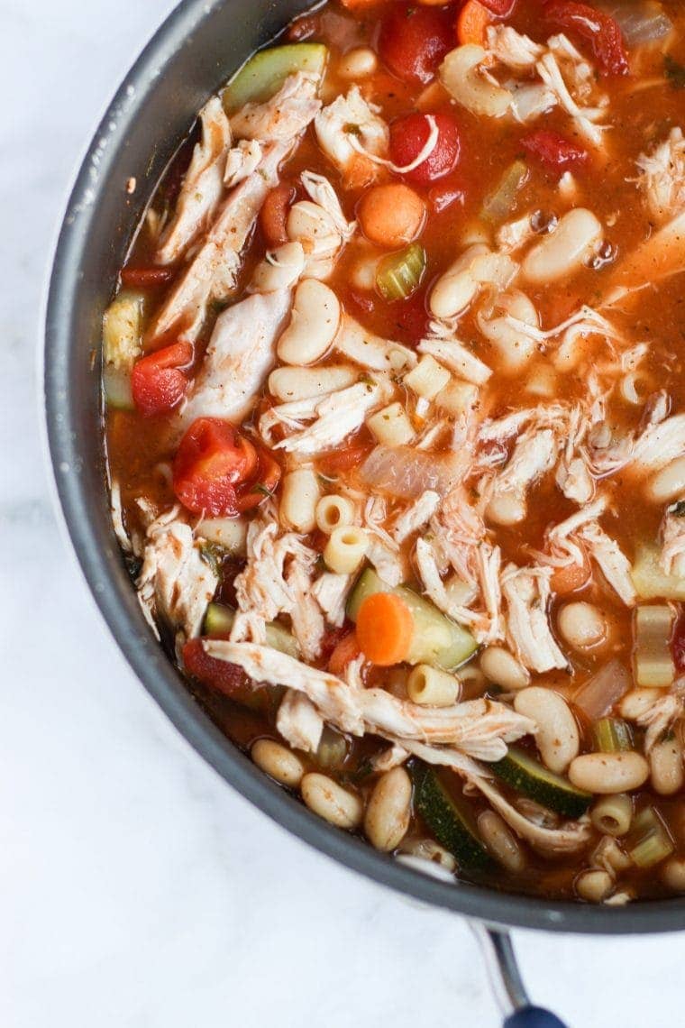 Chicken Minestrone Soup, with it's rich broth and tons of veggies, is a delicious way to warm up with some hearty comfort food.