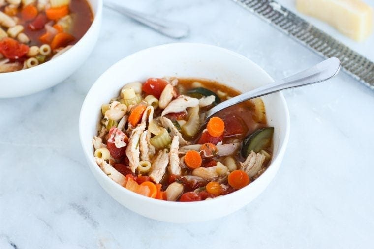 Chicken Minestrone Soup, with it's rich broth and tons of veggies, is a delicious way to warm up with some hearty comfort food.
