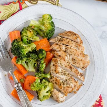 A plate of food with meat and vegetables