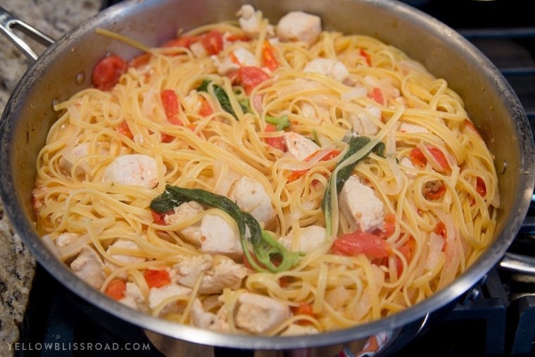 One Pan Tomato Basil Chicken Linguine - A quick and easy pasta dish that's ready in 20 minutes.; a delicious weeknight meal.
