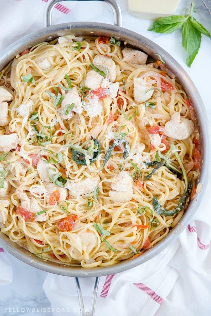 One Pan Tomato Basil Chicken Linguine - A quick and easy pasta dish that's ready in 20 minutes.; a delicious weeknight meal.