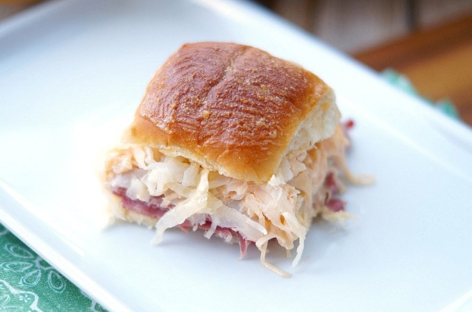 Reuben Sandwich slider on a plate.