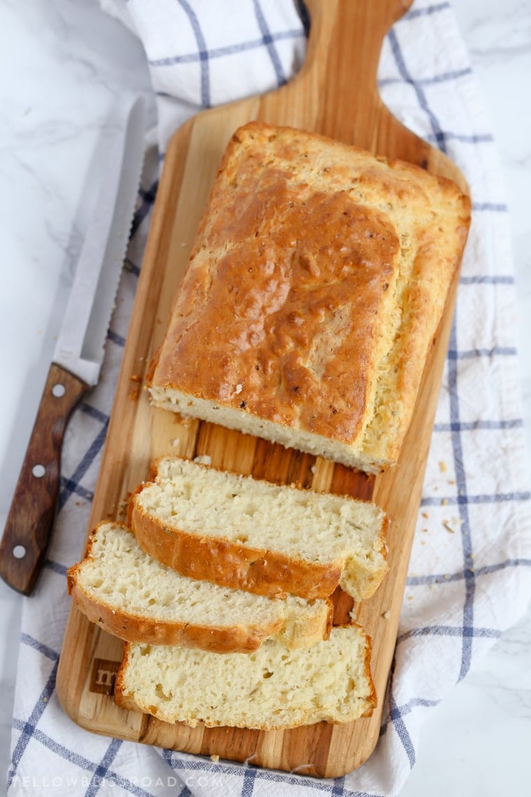 This Parmesan Garlic Herb Quick Bread is a tender, flavorful, savory quick bread that makes a great side dish to any meal.