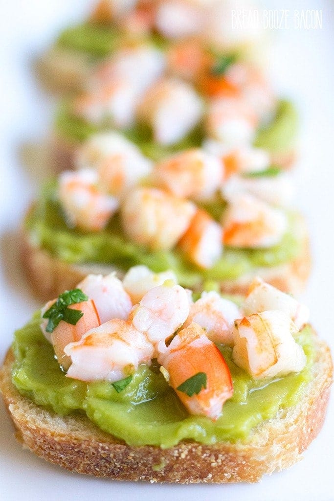 Guacamole Shrimp Bruschetta is an easy, 10-minute appetizer that's full of flavor and perfect for parties and Cinco de Mayo!