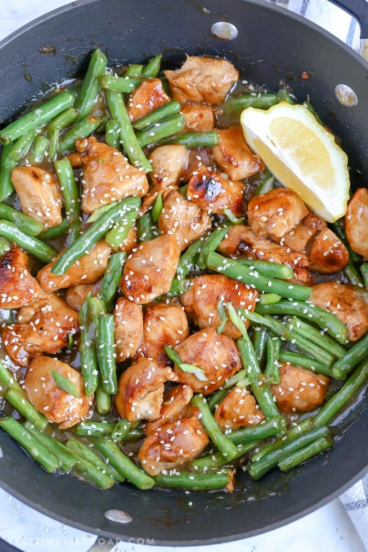 Honey Lemon Chicken and Green Beans in a black skillet