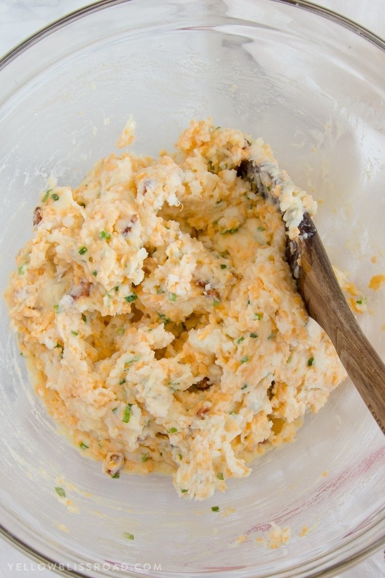 Loaded Mashed Potato Puffs are filled with bacon, cheese and chives and are perfect for an unexpected dinner side or your Easter Brunch!