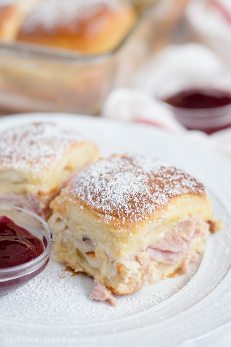 Monte Cristo Sandwich Sliders are the classic sandwich, in "mini" form. Perfect for parties, or just when you want something delicious and a little different and fun. Monte Cristo sandwich Sliders with powdered sugar.