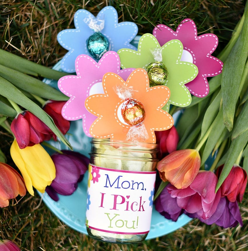 A close up of a flowers in a jar