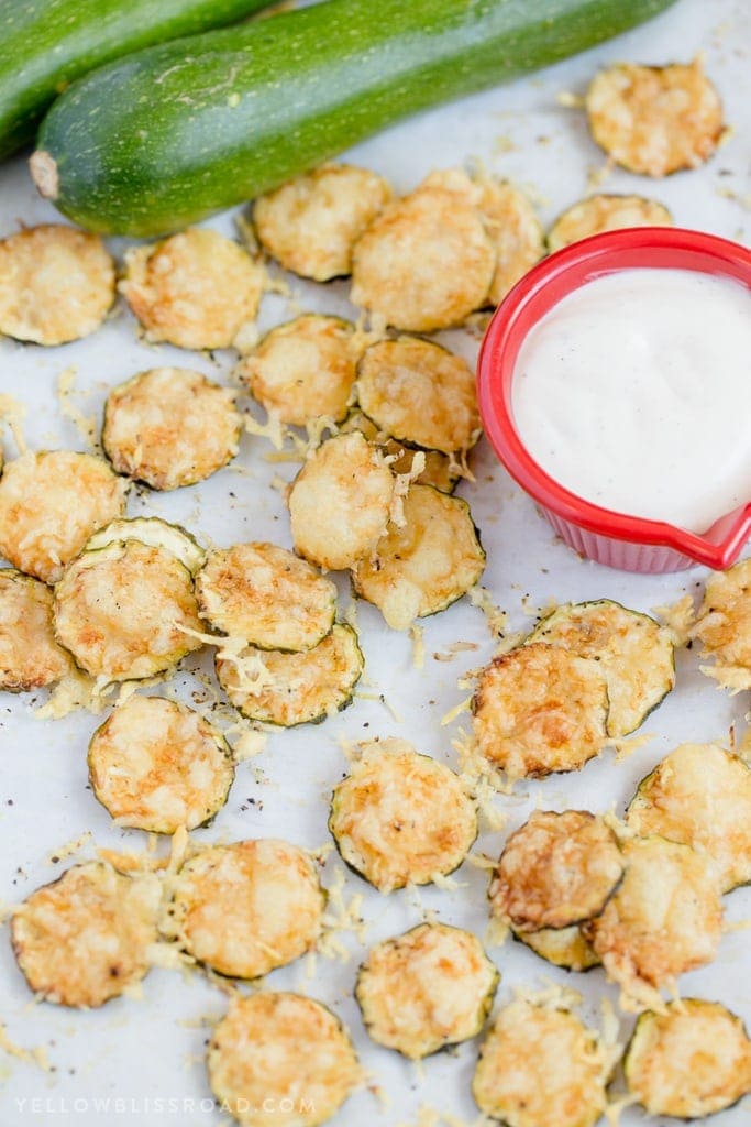 Parmesan Zucchini Crisps are a healthy snack that is simple and easy to make with just two ingredients, plus some Hidden Valley® Simply Ranch for dinning! #ad