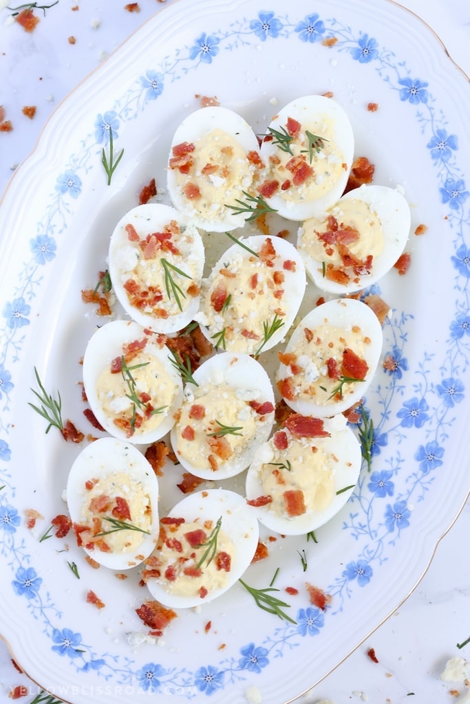 These Ranch, Blue Cheese & Bacon Deviled Eggs are creamy and tangy and the perfect enhancement to your Easter table.