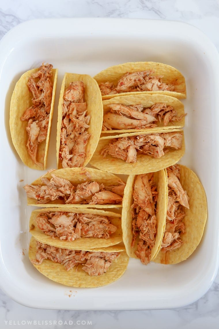 These Slow Cooker Ranch Chicken Tacos are super delicious and a perfect way to switch up Taco Tuesday dinners. Minimal prep and tons of flavor!