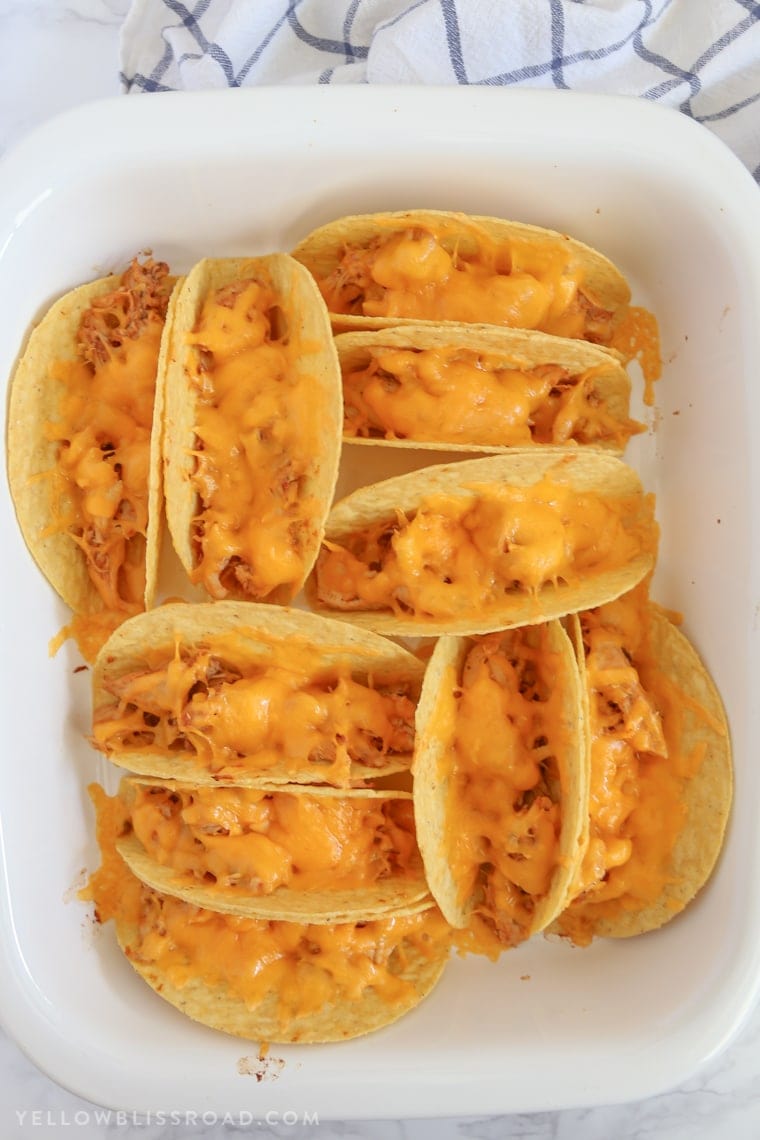 These Slow Cooker Ranch Chicken Tacos are super delicious and a perfect way to switch up Taco Tuesday dinners. Minimal prep and tons of flavor!