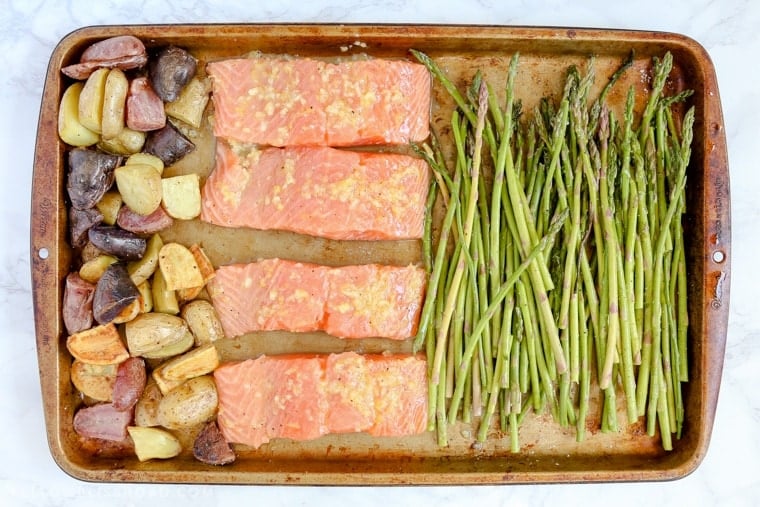 This Salmon, Asparagus & Potatoes Sheet Pan Dinner is a delicious one pan meal that saves valuable time in the kitchen - it's a delicious, easy weeknight meal!