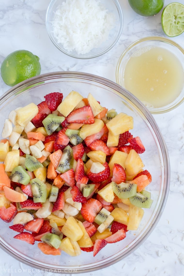 This Tropical Fruit Salad with Honey Lime Dressing is the light and refreshing and the perfect snack or side dish to any spring or summer meal.