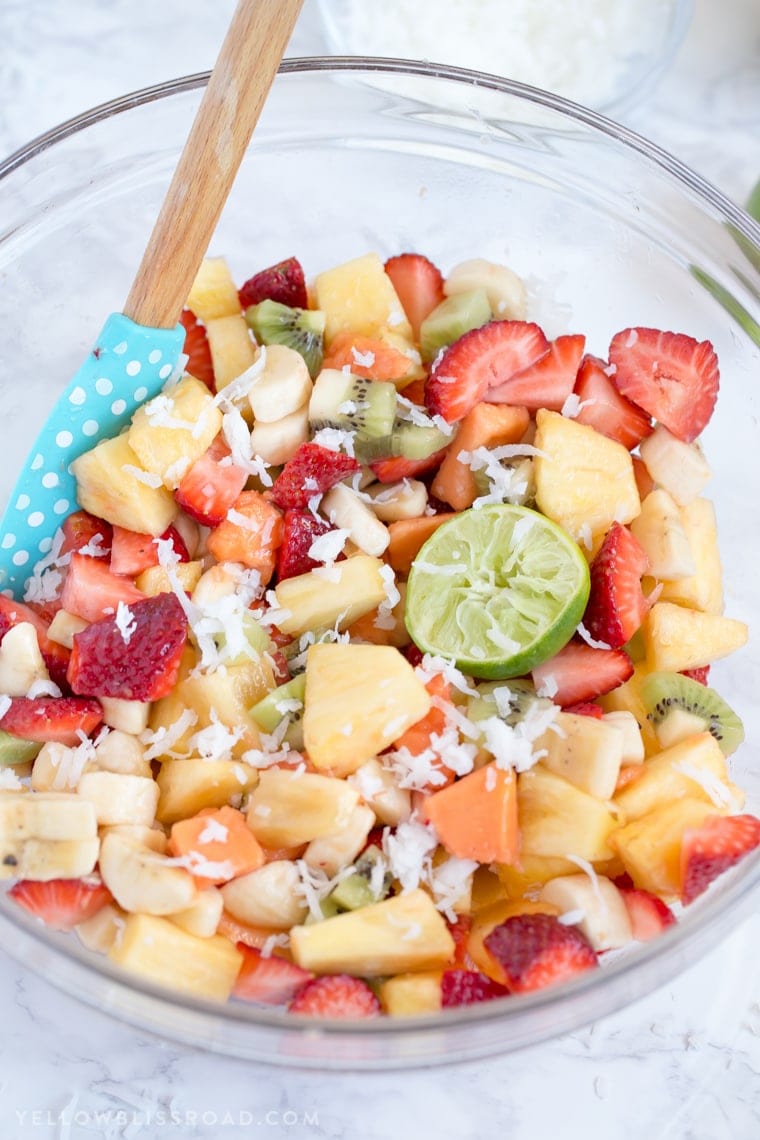 This Tropical Fruit Salad with Honey Lime Dressing is the light and refreshing and the perfect snack or side dish to any spring or summer meal.