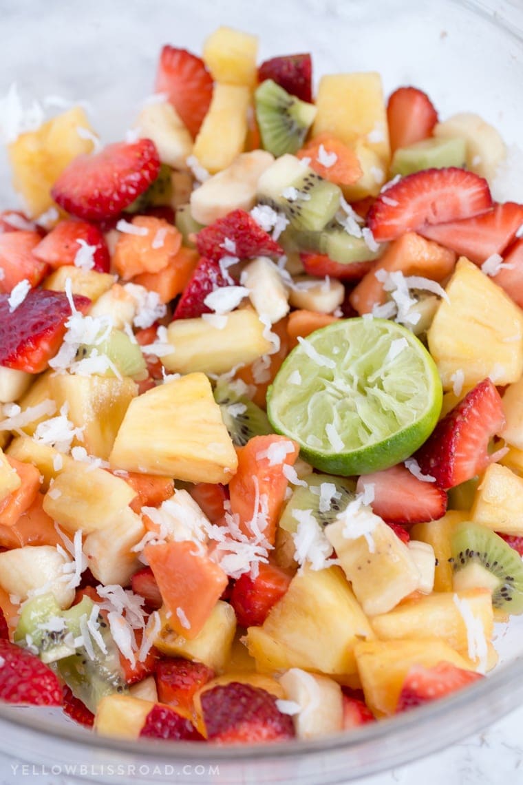 This Tropical Fruit Salad with Honey Lime Dressing is the light and refreshing and the perfect snack or side dish to any spring or summer meal.
