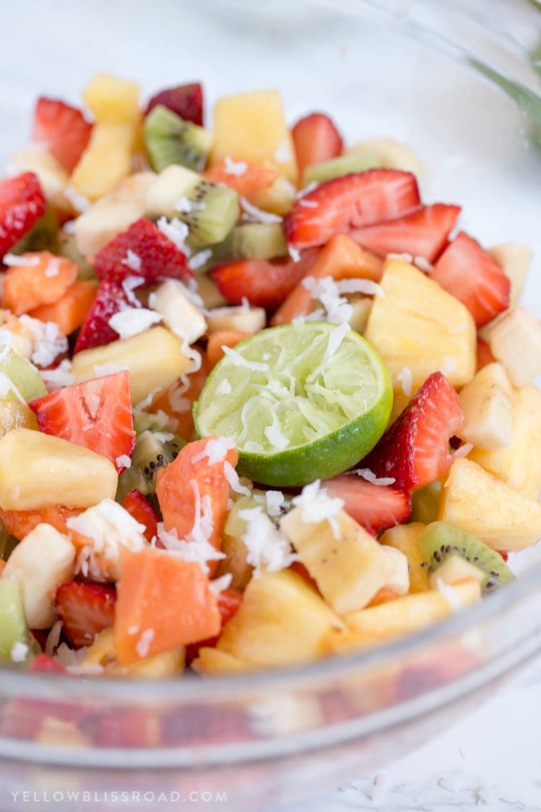 This Tropical Fruit Salad with Honey Lime Dressing is the light and refreshing and the perfect snack or side dish to any spring or summer meal.