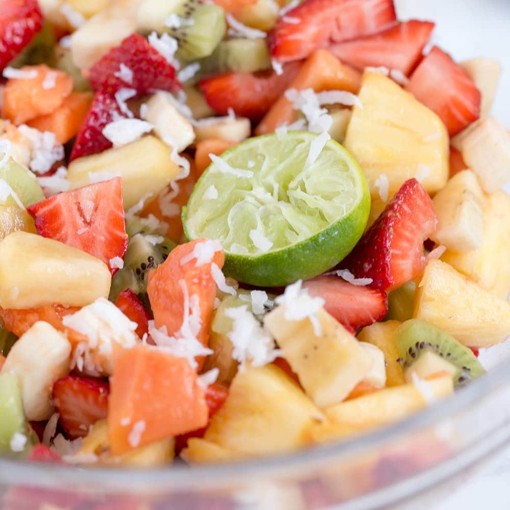 This Tropical Fruit Salad with Honey Lime Dressing is the light and refreshing and the perfect snack or side dish to any spring or summer meal.