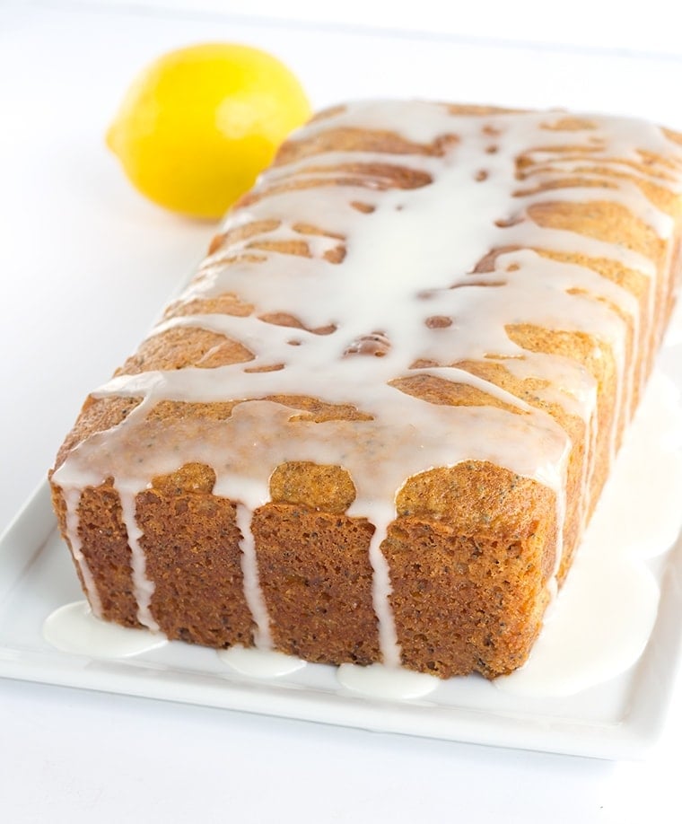 Lemon Poppy Seed Bread topped with a Lemon Glaze - A sweet quick bread that's perfect for brunch