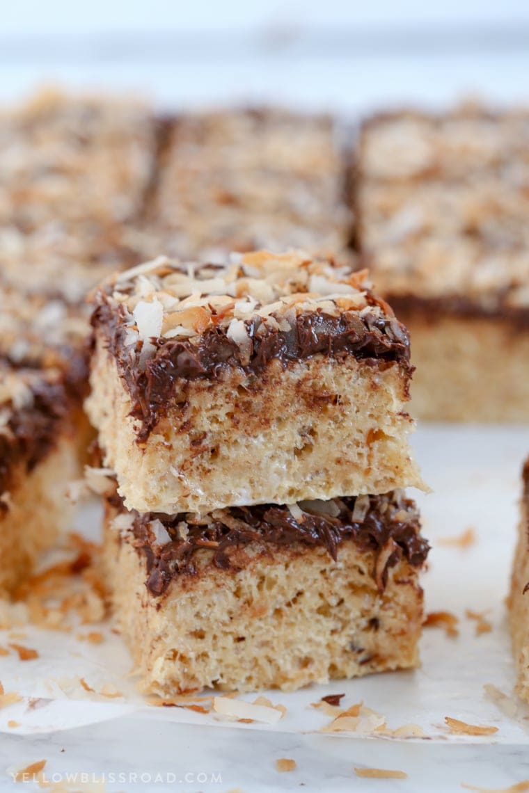 These Chocolate, Coconut Caramel Krispy Treats are inspired by Samoas - a classic favorite Girl Scout Cookie! A fun and yummy dessert that everyone will love.