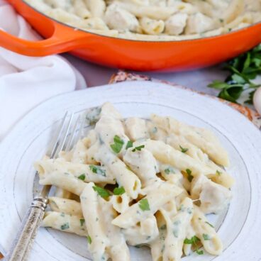 A plate of creamy garlic penne pasta