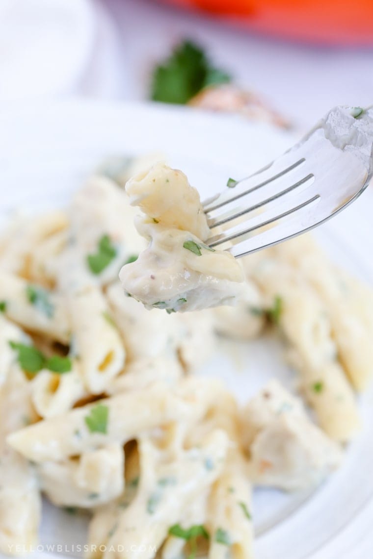 Tender pasta and chicken smothered in a creamy, garlicky sauce - This Creamy Garlic Penne Pasta with Chicken is a delicious and easy meal for any night of the week!