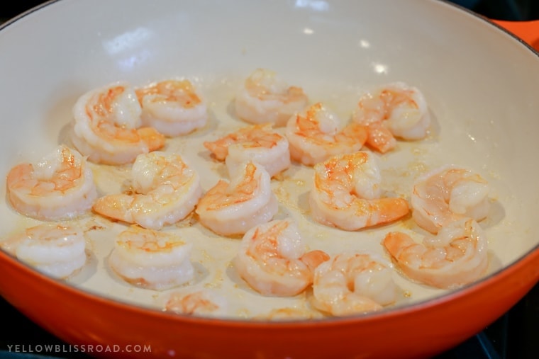 shrimp cooking in a skillet