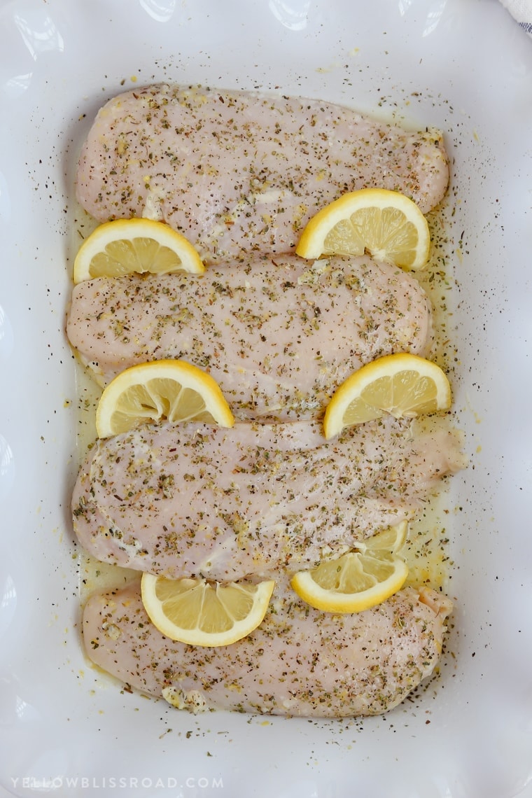 Baked Lemon Chicken is sure to be a new weeknight dinner staple. The most tender and juicy chicken ever, and so easy and full of flavor!