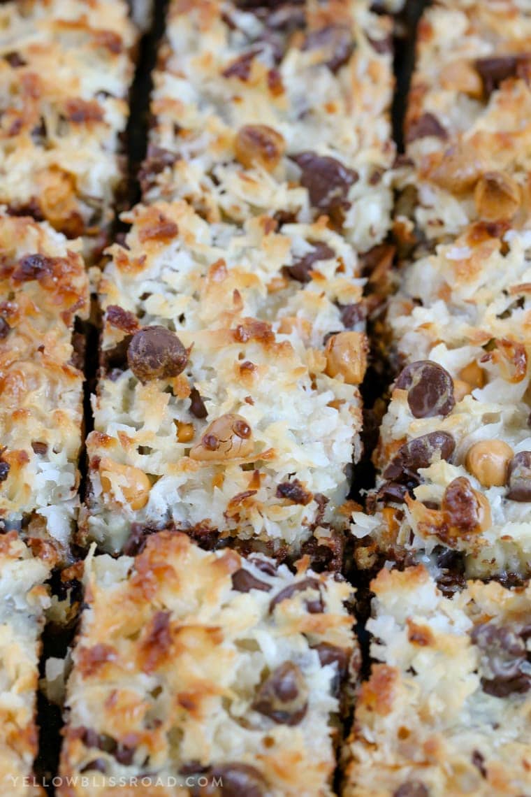 Magic Layer Brownie Bars have a rich brownie base, chocolate & butterscotch chips. coconut and sweetened condensed milk. Like the seven layer bars, only better!