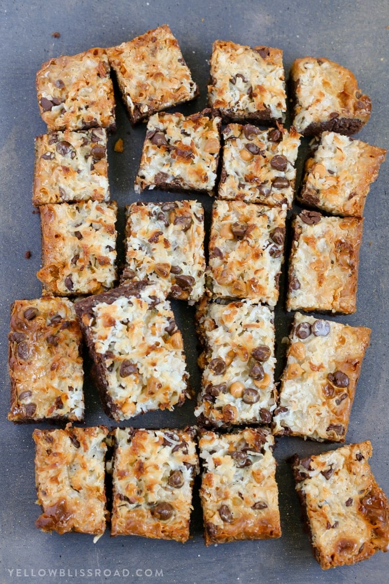 Magic Layer Brownie Bars have a rich brownie base, chocolate & butterscotch chips. coconut and sweetened condensed milk. Like the seven layer bars, only better!