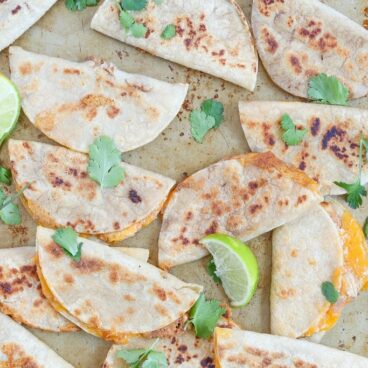 A close up of cheese quesadillas