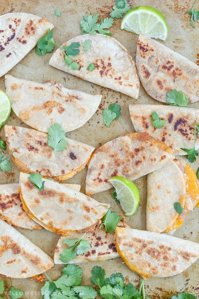 Mini Ranch Chicken Bean and Cheese Quesadillas are a fun appetizer party food or snack that's perfect for Cinco di Mayo!