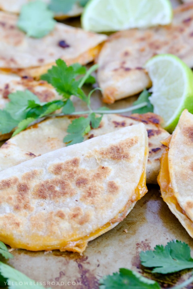 Mini Ranch Chicken Bean and Cheese Quesadillas are a fun appetizer party food or snack that's perfect for Cinco di Mayo!
