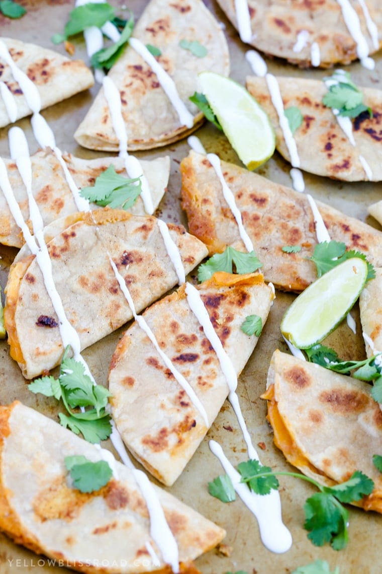 Mini Ranch Chicken Bean and Cheese Quesadillas are a fun appetizer party food or snack that's perfect for Cinco di Mayo!