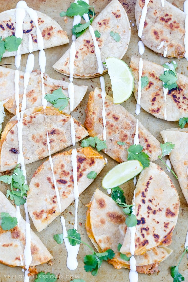 Mini Ranch Chicken Bean and Cheese Quesadillas are a fun appetizer party food or snack that's perfect for Cinco di Mayo!