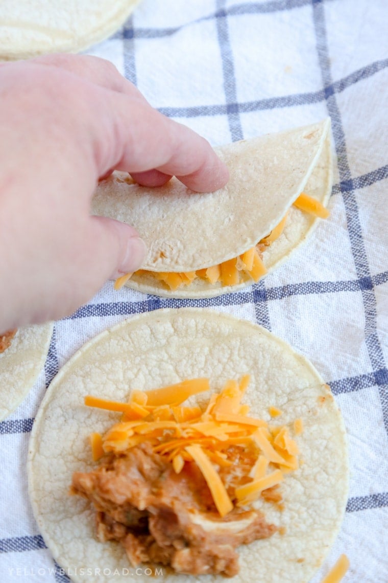 Mini Ranch Chicken Bean and Cheese Quesadillas are a fun appetizer party food or snack that's perfect for Cinco di Mayo!