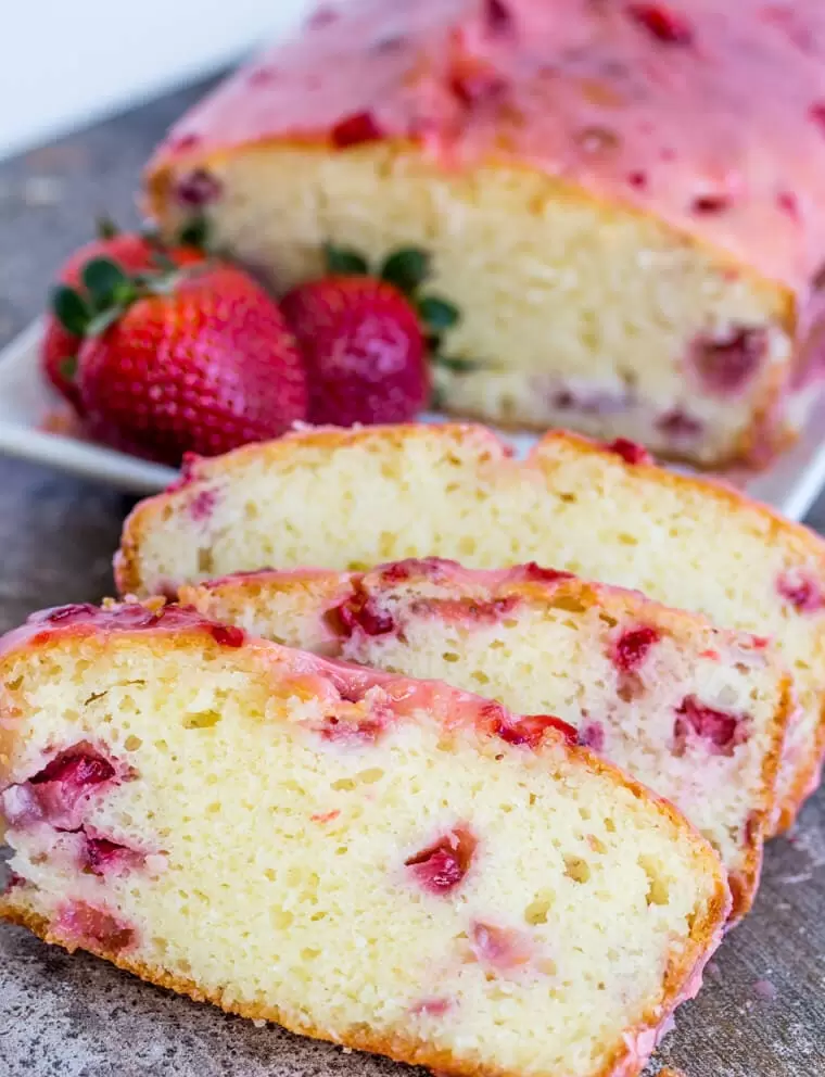Strawberry Pound Cake is deliciously moist and flavorful; a one bowl treat topped with a sweet strawberry glaze.