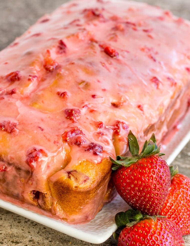 Strawberry Pound Cake is deliciously moist and flavorful; a one bowl treat topped with a sweet strawberry glaze.