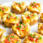 Taco Cups are an easy to make appetizer perfect for all your parties! Customize them with your favorite flavors for a bite you can't resist!