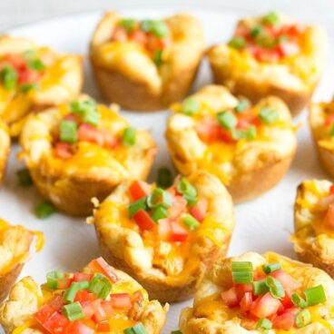 Taco Cups are an easy to make appetizer perfect for all your parties! Customize them with your favorite flavors for a bite you can't resist!