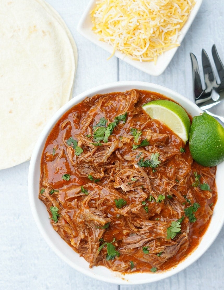 Instant Pot Spicy Shredded Mexican Beef is the perfect smoky chipotle base for enchiladas or beef tacos, especially on Cinco de Mayo!