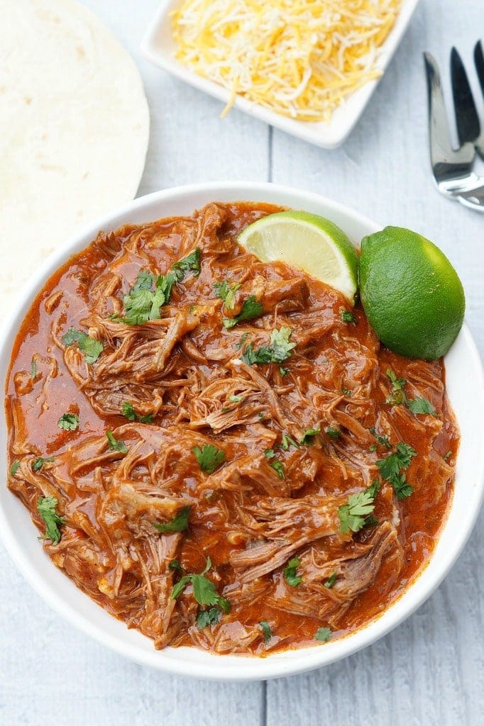 Instant Pot Spicy Shredded Mexican Beef is the perfect smoky chipotle base for enchiladas or beef tacos, especially on Cinco de Mayo!