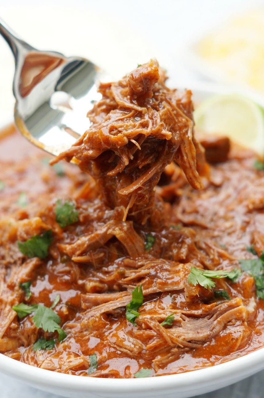 Instant Pot Spicy Shredded Mexican Beef is the perfect smoky chipotle base for enchiladas or beef tacos, especially on Cinco de Mayo!