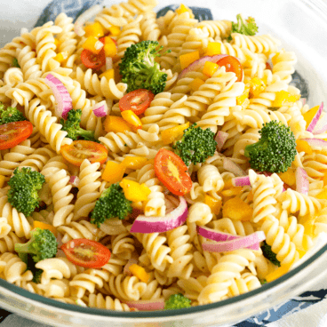 This Easy Vegetable Pasta Salad is one of my go-to summer recipes. It comes together in a snap and can be made ahead of time for a great menu addition!