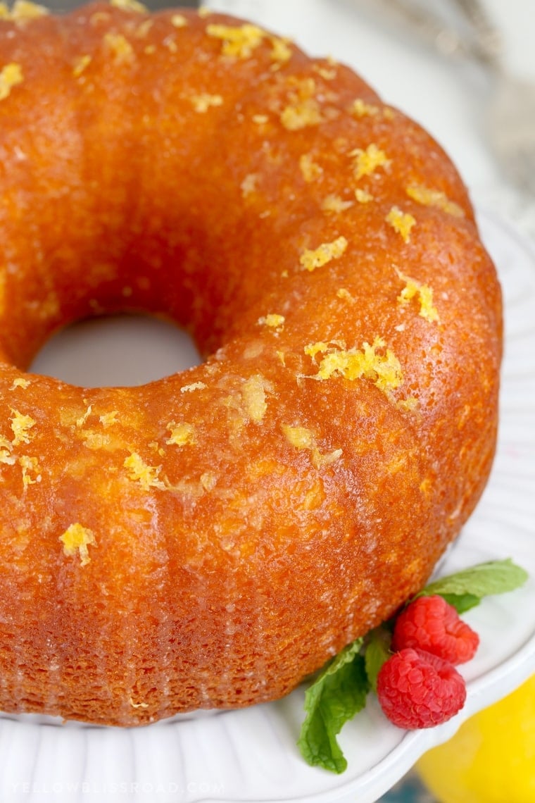 Lemon Bundt Cake - Intensely flavored lemon cake finished with a unique glazing technique to lock in even more lemon flavor. It's the best summer dessert!