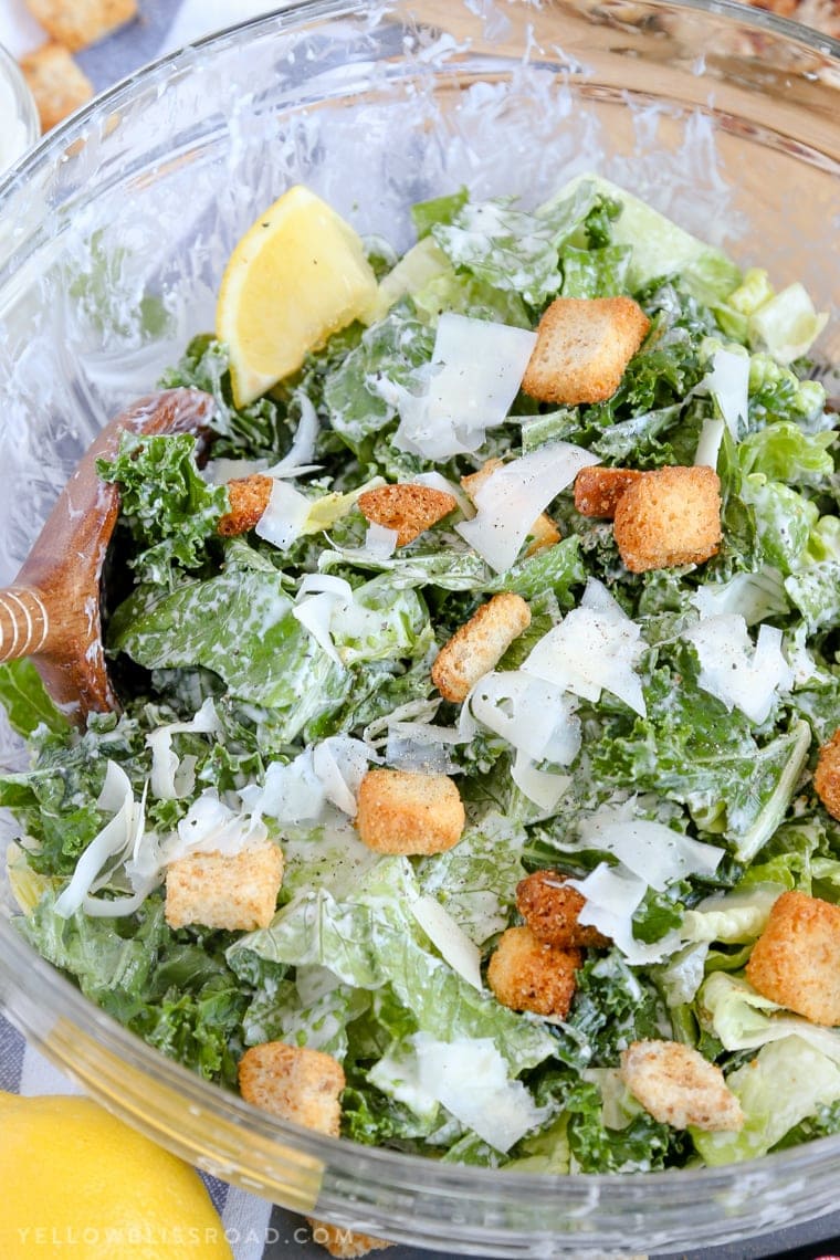 Lemon Kale Caesar Salad tossed with homemade dressing and croutons