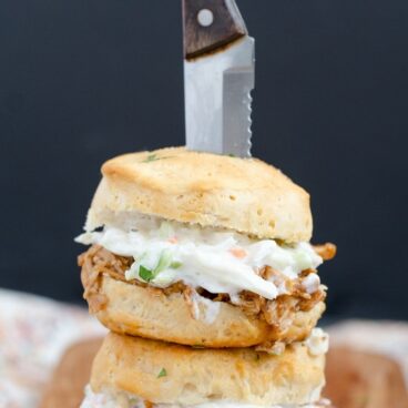 Shredded BBQ chicken on biscuits