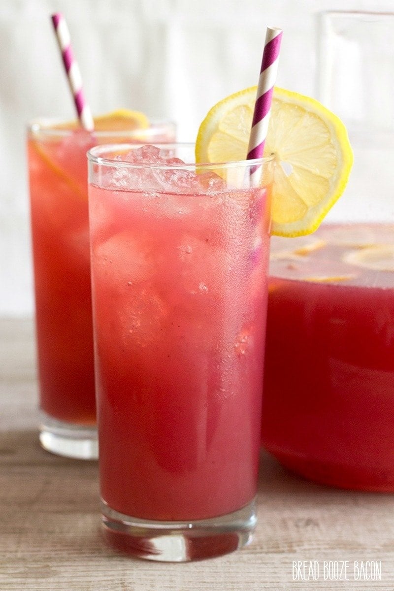 A glass of Blackberry Lemonade on a table